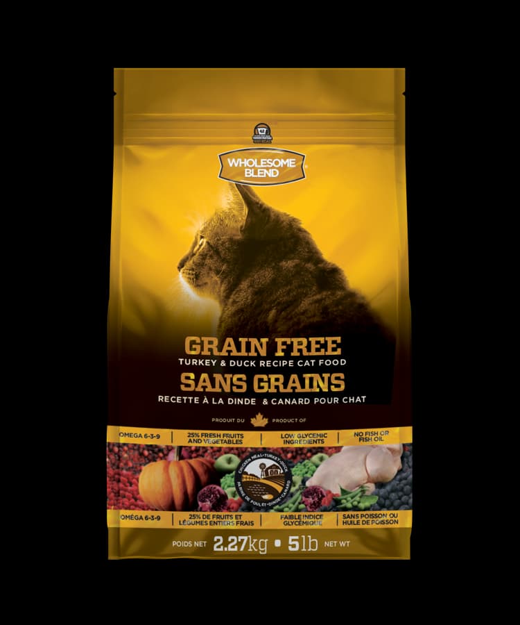 Wholesome Blend Grain Free Turkey and Duck cat food bag with cat and fresh ingredients.